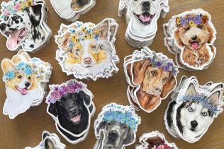 Stacks of dog stickers. Pet stickers. Dogs with flower crowns.