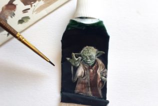 Tiny painting of Star Wars Yoda using the force