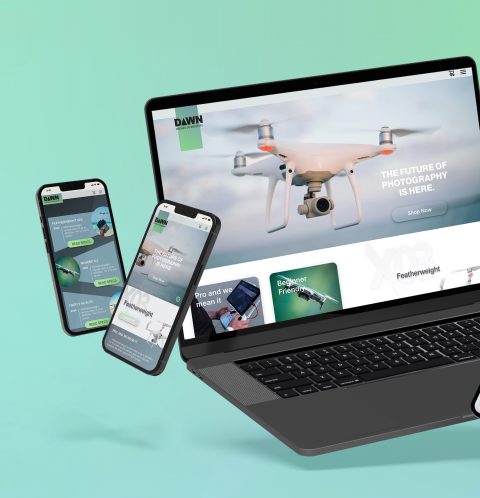 Mint green iphone and laptop mockups of Dawn Drones website