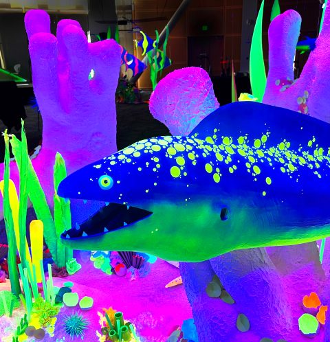 Spotted eel black light sculpture art installation